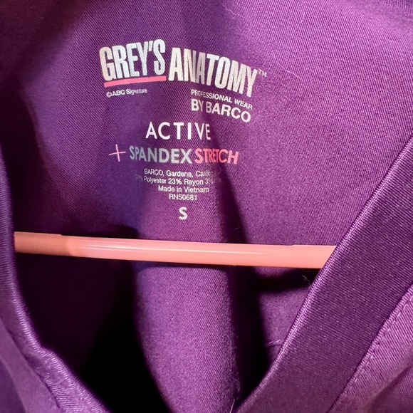 Grey's Anatomy Active Stretch Scrub Top in Rich Purple - Picture 2 of 3